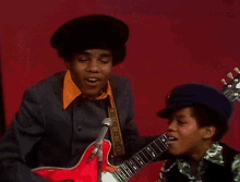 tito jackson and michael jackson gif